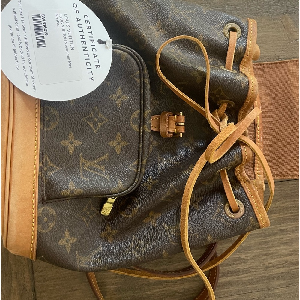 authentic LOUIS VUITTON Monogram Mini Montsouris Backpack